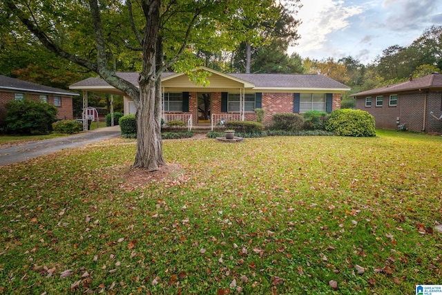 ranch-style house featuring a front yard and a porch