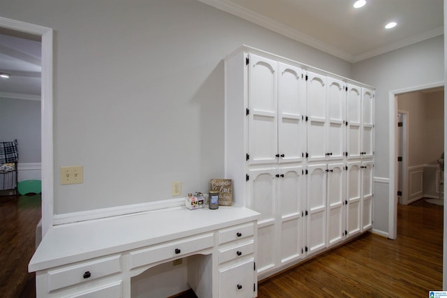 office area with ornamental molding and dark hardwood / wood-style flooring