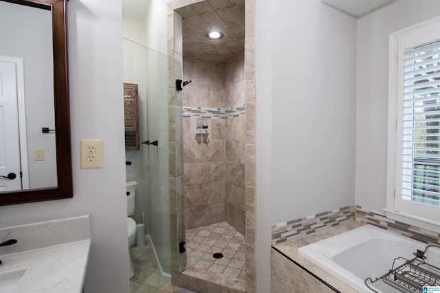 full bathroom with independent shower and bath, tile patterned flooring, vanity, and toilet