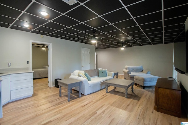 living room with light hardwood / wood-style flooring