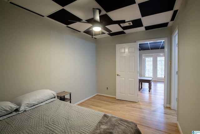 unfurnished bedroom with light hardwood / wood-style floors and ceiling fan