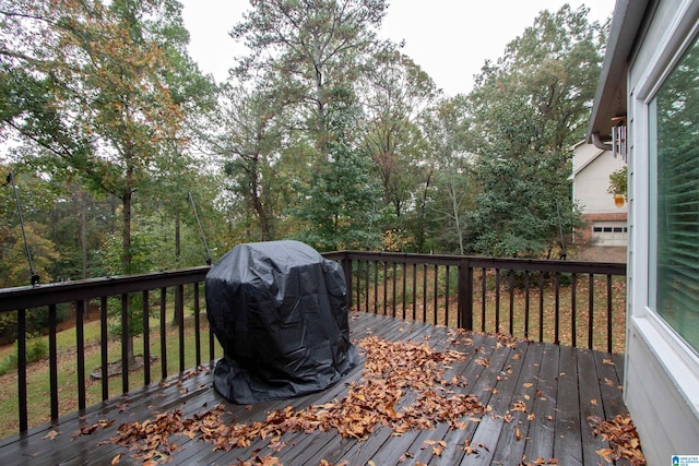 deck featuring a grill