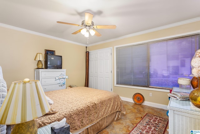 bedroom with ceiling fan, a closet, and ornamental molding