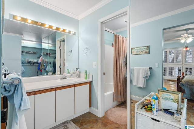 bathroom featuring tile patterned floors, crown molding, vanity, shower / bath combo with shower curtain, and ceiling fan