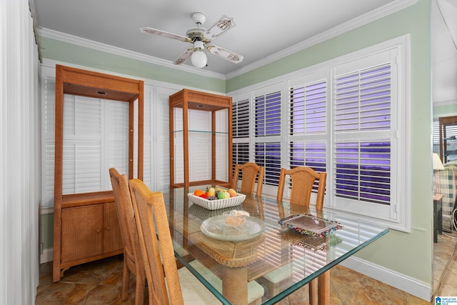 dining room featuring ceiling fan and crown molding