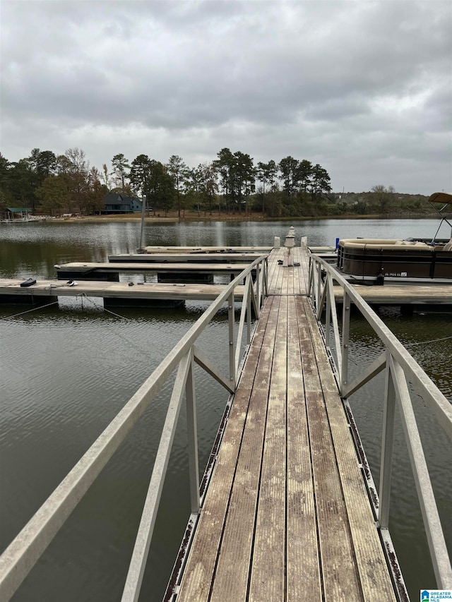 view of dock with a water view