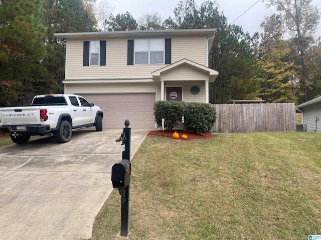 front of property featuring a garage and a front lawn