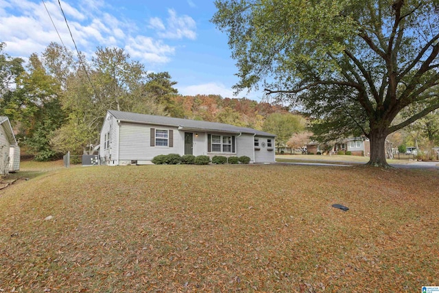 ranch-style home with a front yard