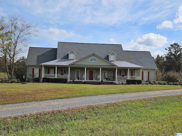 country-style home with a porch and a front lawn