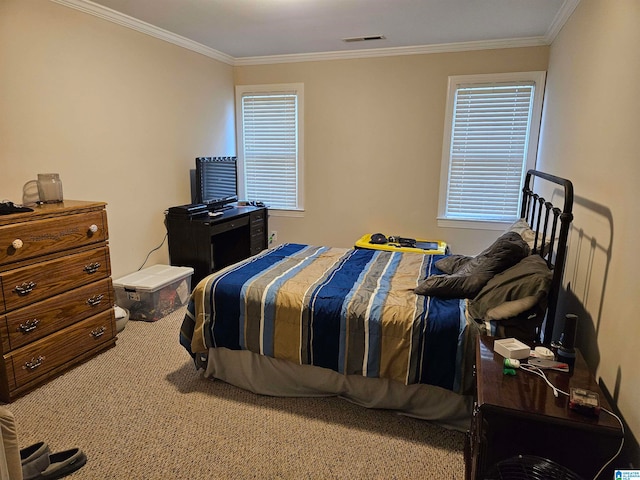 bedroom featuring crown molding and carpet flooring