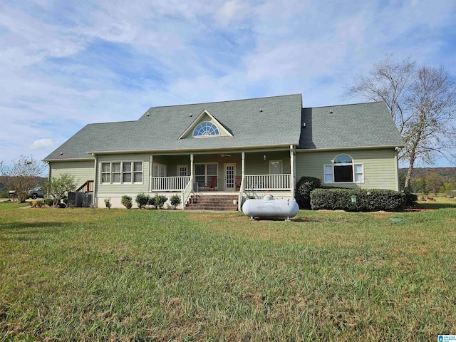 view of front of property featuring covered porch and a front lawn