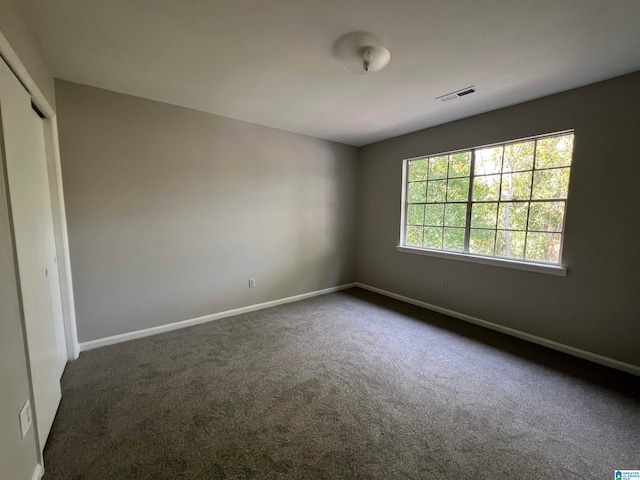 view of carpeted spare room