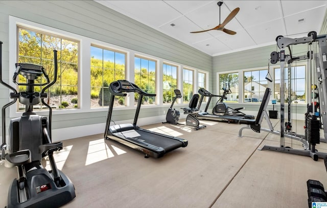 workout area with a healthy amount of sunlight and ceiling fan