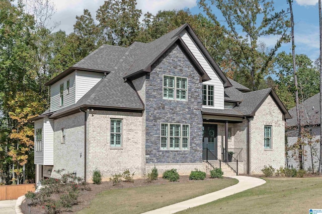 view of front of property with a front lawn