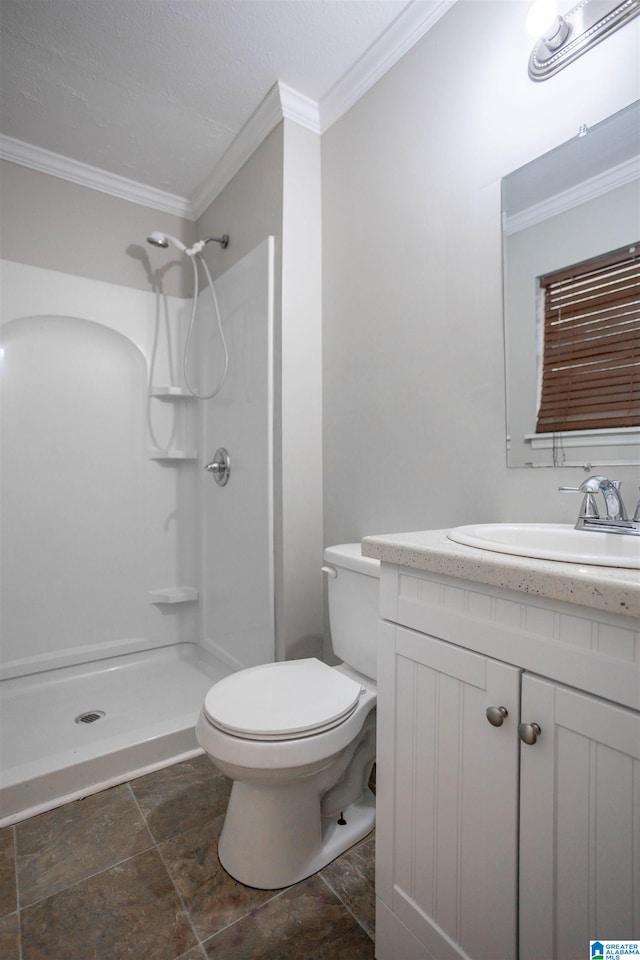 bathroom with a shower, vanity, toilet, and crown molding