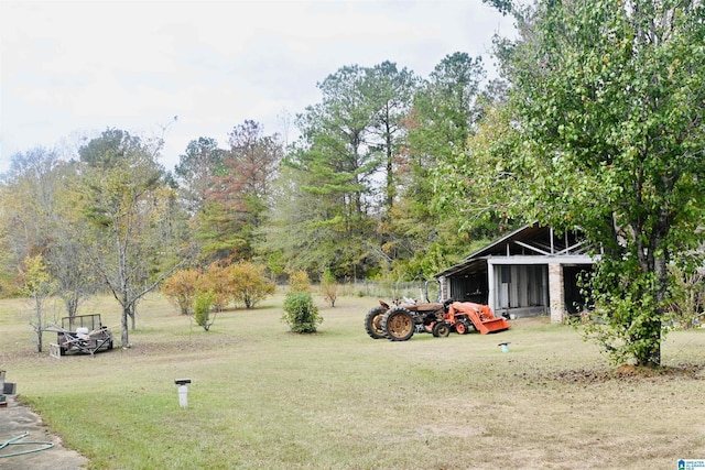 477 County Road 183, Eutaw, AL 35462 - view of green lawn featuring an outbuilding