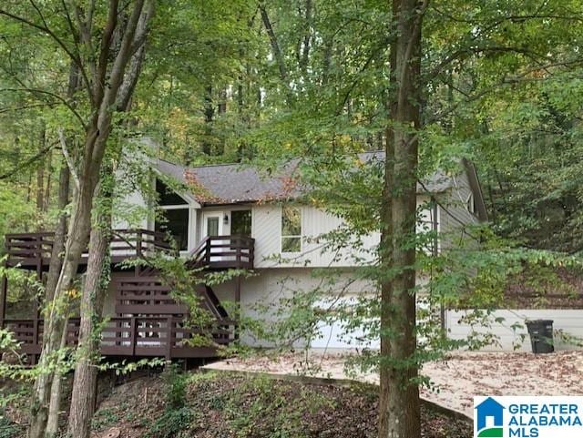 view of home's exterior featuring a deck