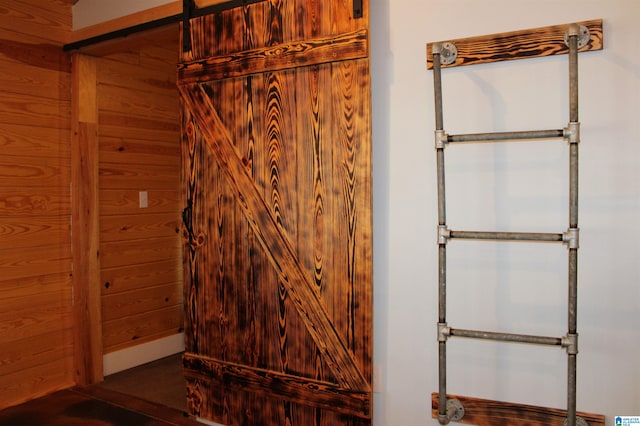 bathroom featuring wood walls