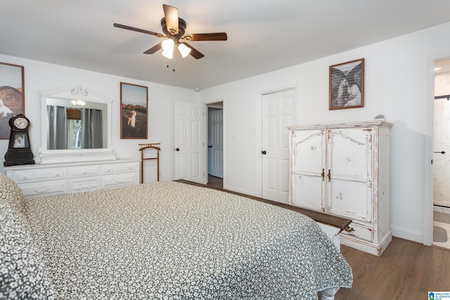 bedroom featuring hardwood / wood-style flooring and ceiling fan