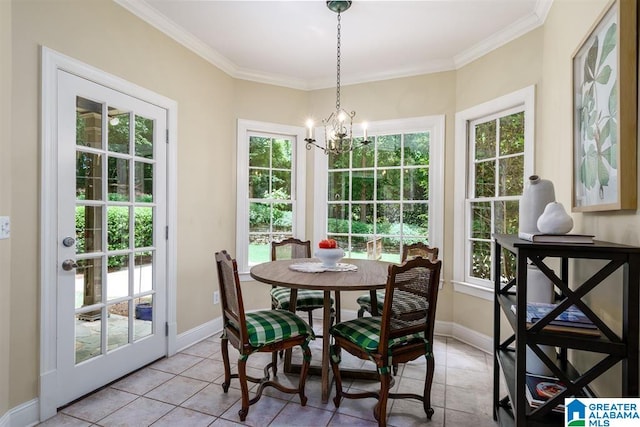 sunroom / solarium with a healthy amount of sunlight and a chandelier