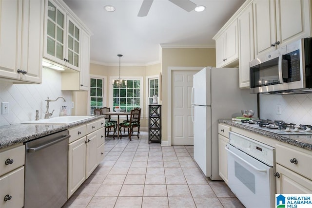 kitchen featuring white cabinetry and appliances with stainless steel finishes