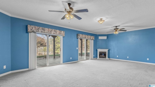 unfurnished living room with crown molding, a wall unit AC, carpet floors, and ceiling fan