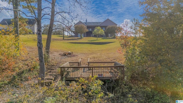 exterior space featuring a yard and a deck