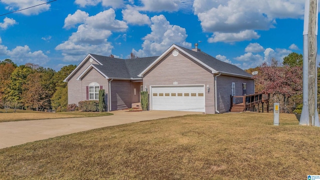 front facade featuring a front yard and a garage