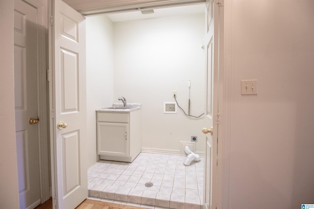 bathroom featuring sink and tile patterned floors