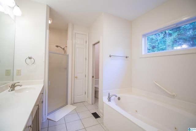 full bathroom featuring separate shower and tub, vanity, tile patterned floors, and toilet