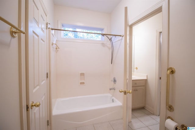 bathroom with tile patterned flooring, shower / bath combination, and vanity