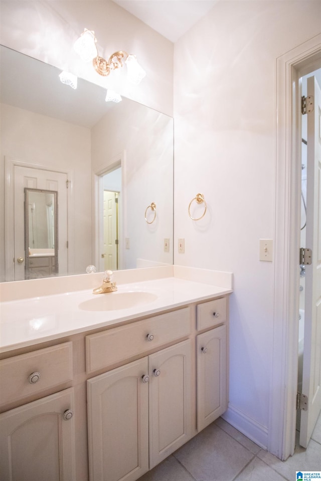 bathroom featuring vanity and tile patterned flooring