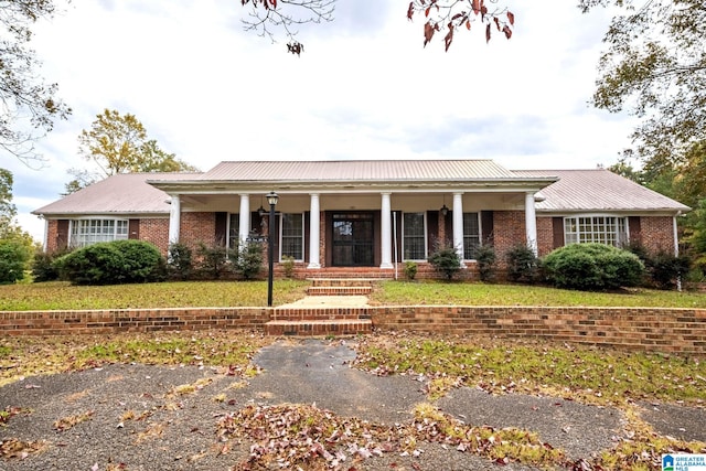 view of front of home featuring covered porch