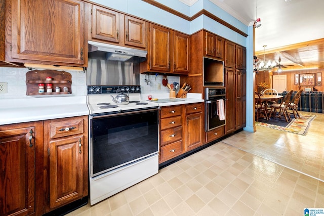 kitchen with tasteful backsplash, black oven, white electric stove, hanging light fixtures, and a chandelier