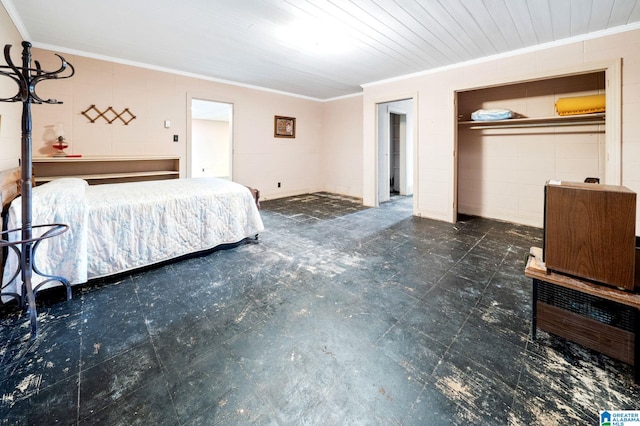 unfurnished bedroom featuring a closet and crown molding