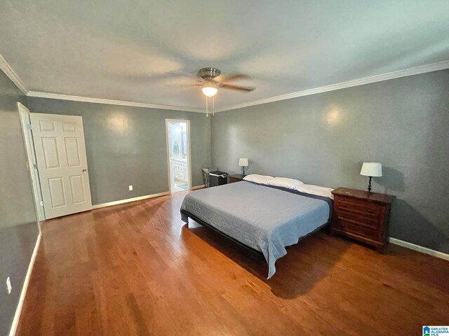 bedroom featuring crown molding, hardwood / wood-style flooring, and ceiling fan