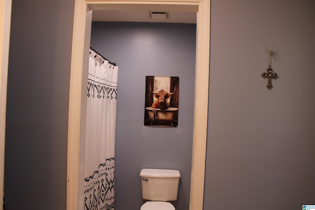 bathroom featuring toilet