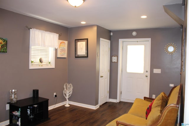 entryway with dark wood-type flooring