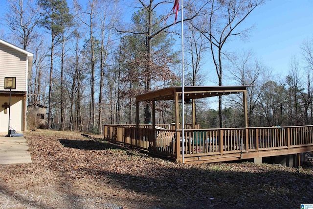 view of yard with a wooden deck