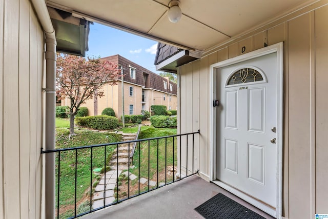 entrance to property with a balcony