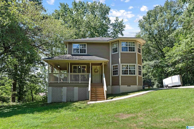 view of front of house featuring a front yard and covered porch