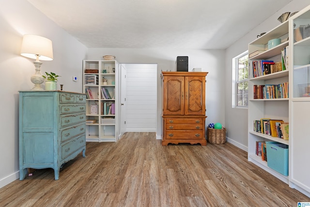 miscellaneous room with hardwood / wood-style flooring