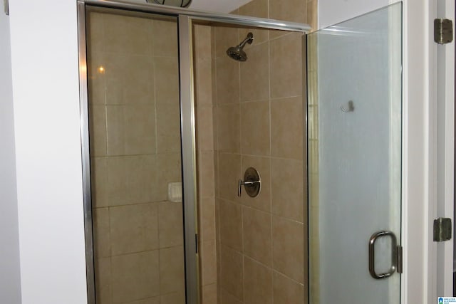 bathroom with an enclosed shower