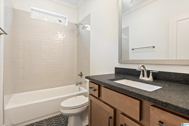 full bathroom featuring vanity, ornamental molding, toilet, and tiled shower / bath