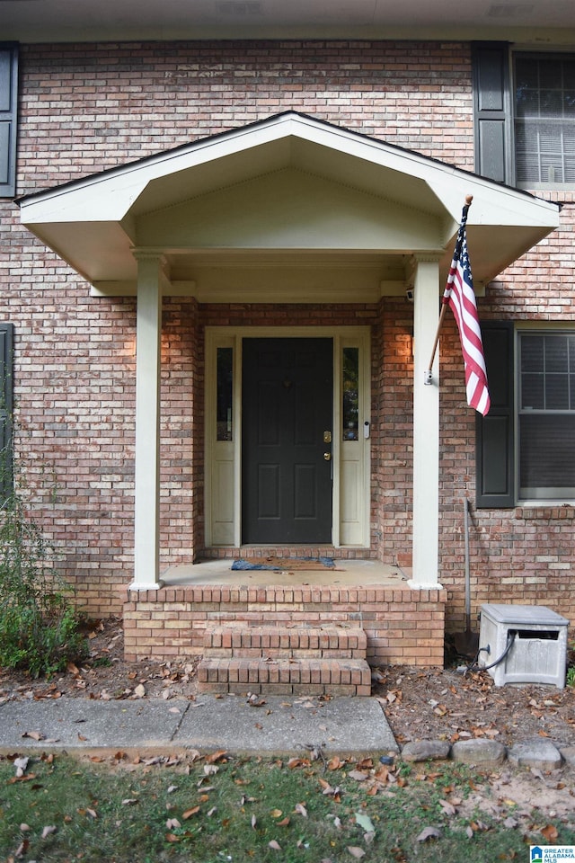 property entrance with covered porch