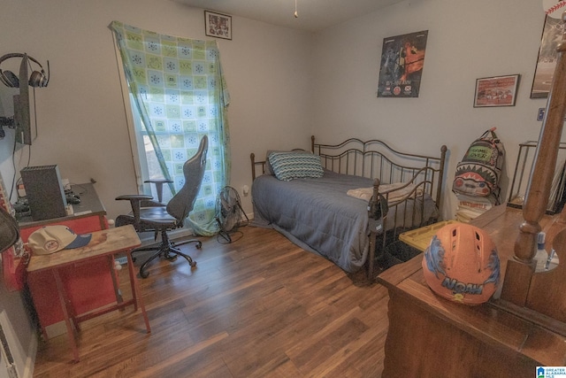 bedroom featuring hardwood / wood-style flooring