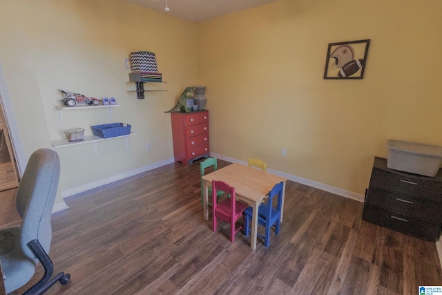 playroom featuring dark hardwood / wood-style flooring