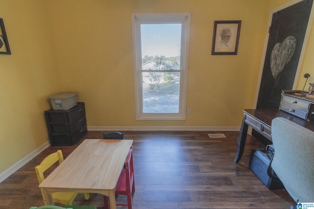 office area featuring dark wood-type flooring