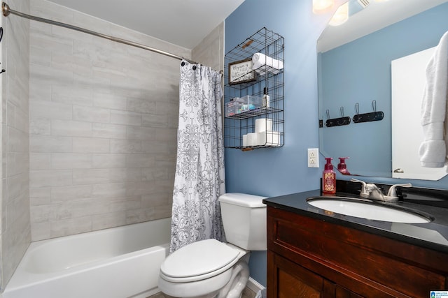 full bathroom featuring toilet, shower / bath combo, and vanity