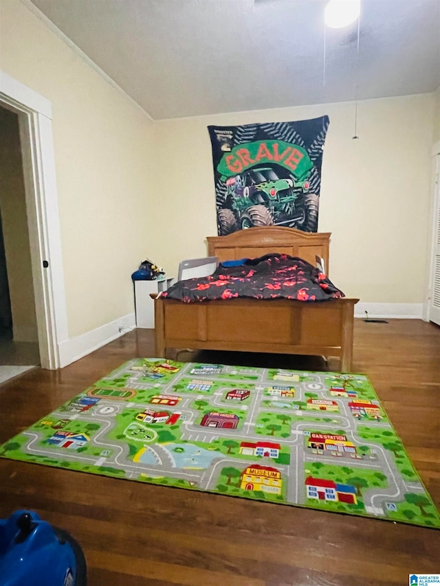 bedroom featuring dark hardwood / wood-style floors